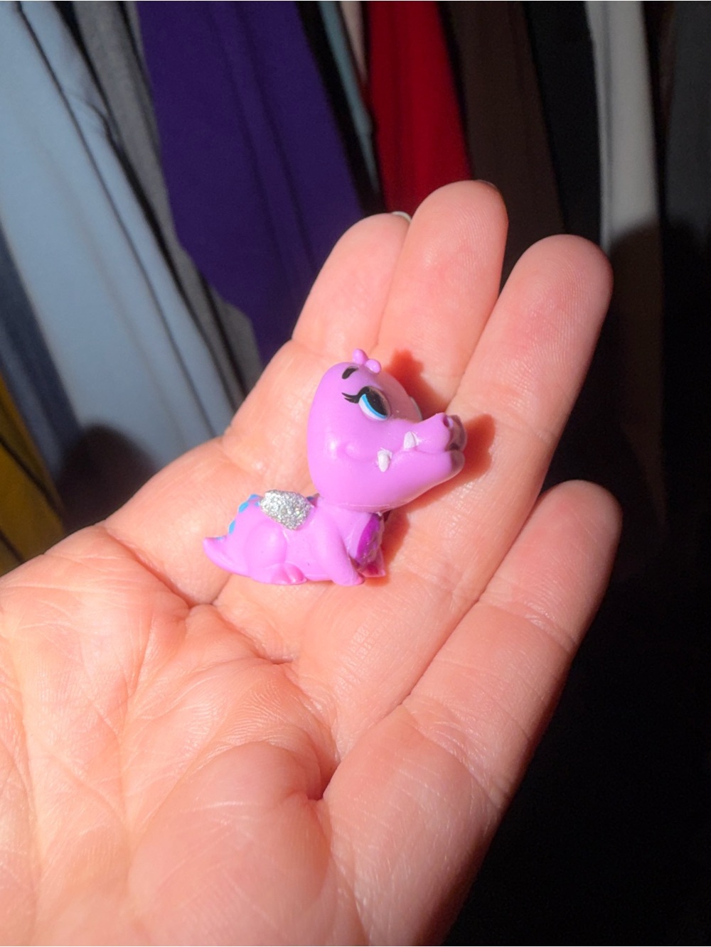 Tiny purple dragon toy